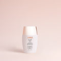 Solaria Mineral SPF 50+ antioxidant sunscreen serum, shown against a pink background